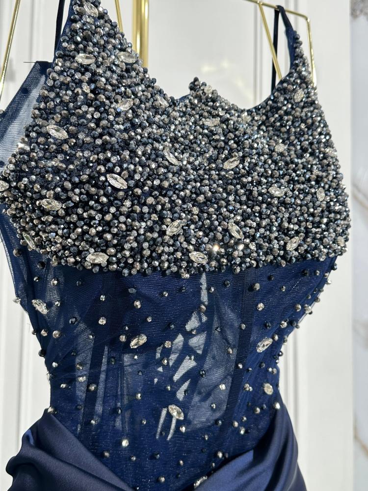 Embroidered taffeta dress on the hill