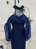 فستان باربي وأكمام الجزرة