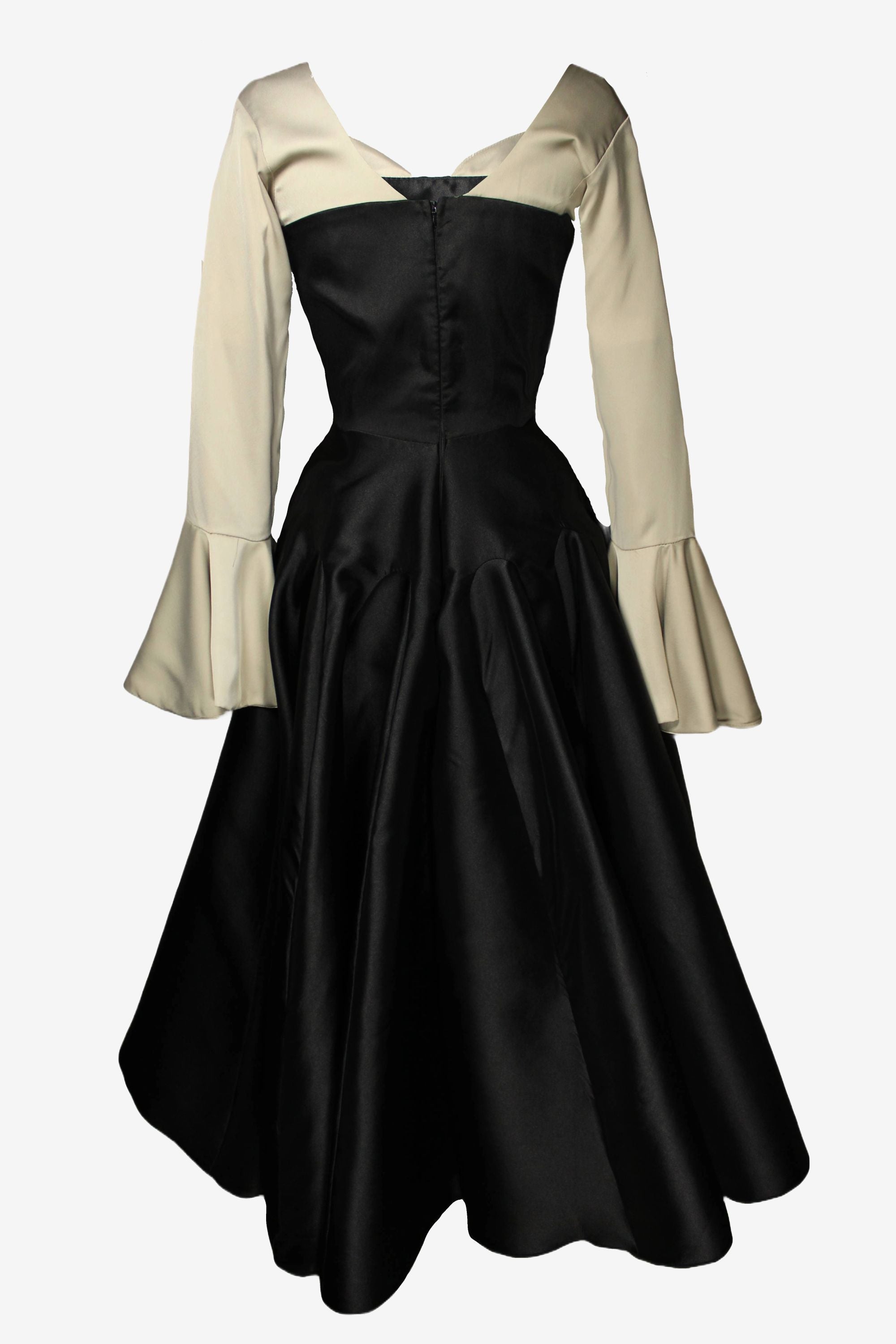 Black dress with beige sleeves on a white background