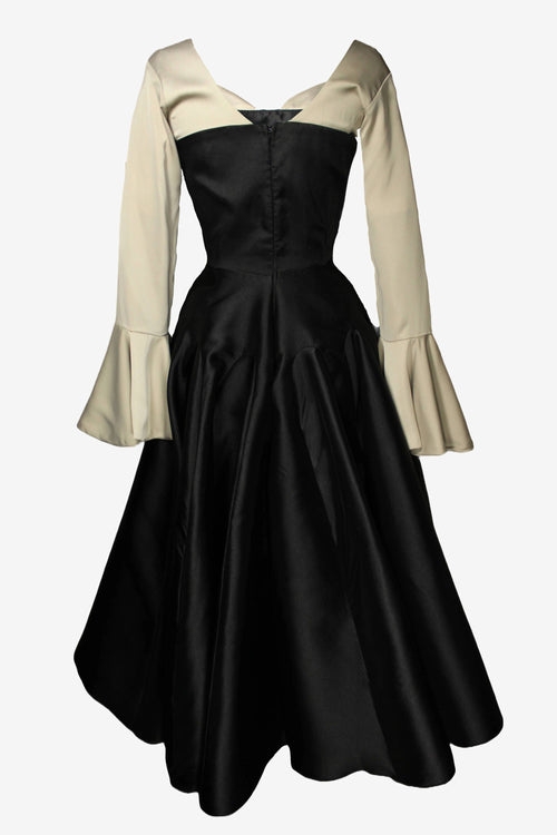 Black dress with beige sleeves on a white background