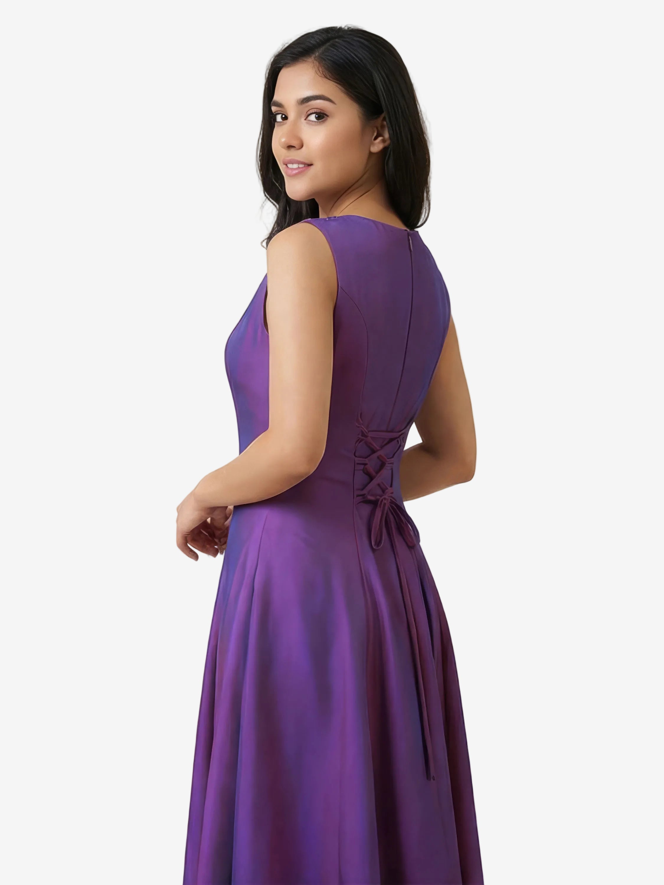Woman wearing a purple dress against a beige background