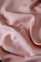 Close-up of pink fabric with folds