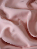 Close-up of pink fabric with folds
