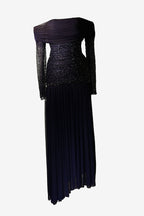 Black evening gown with sequin detailing on a white background