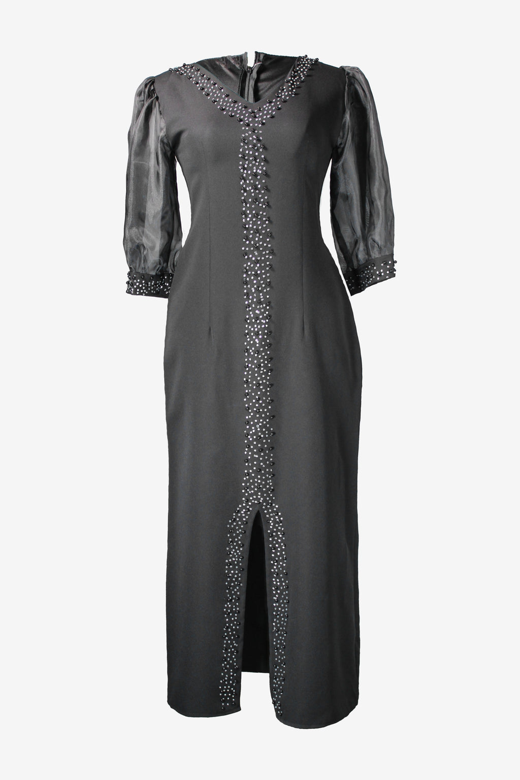 Black dress with silver embellishments on a white background