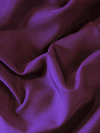 Close-up of purple fabric with folds