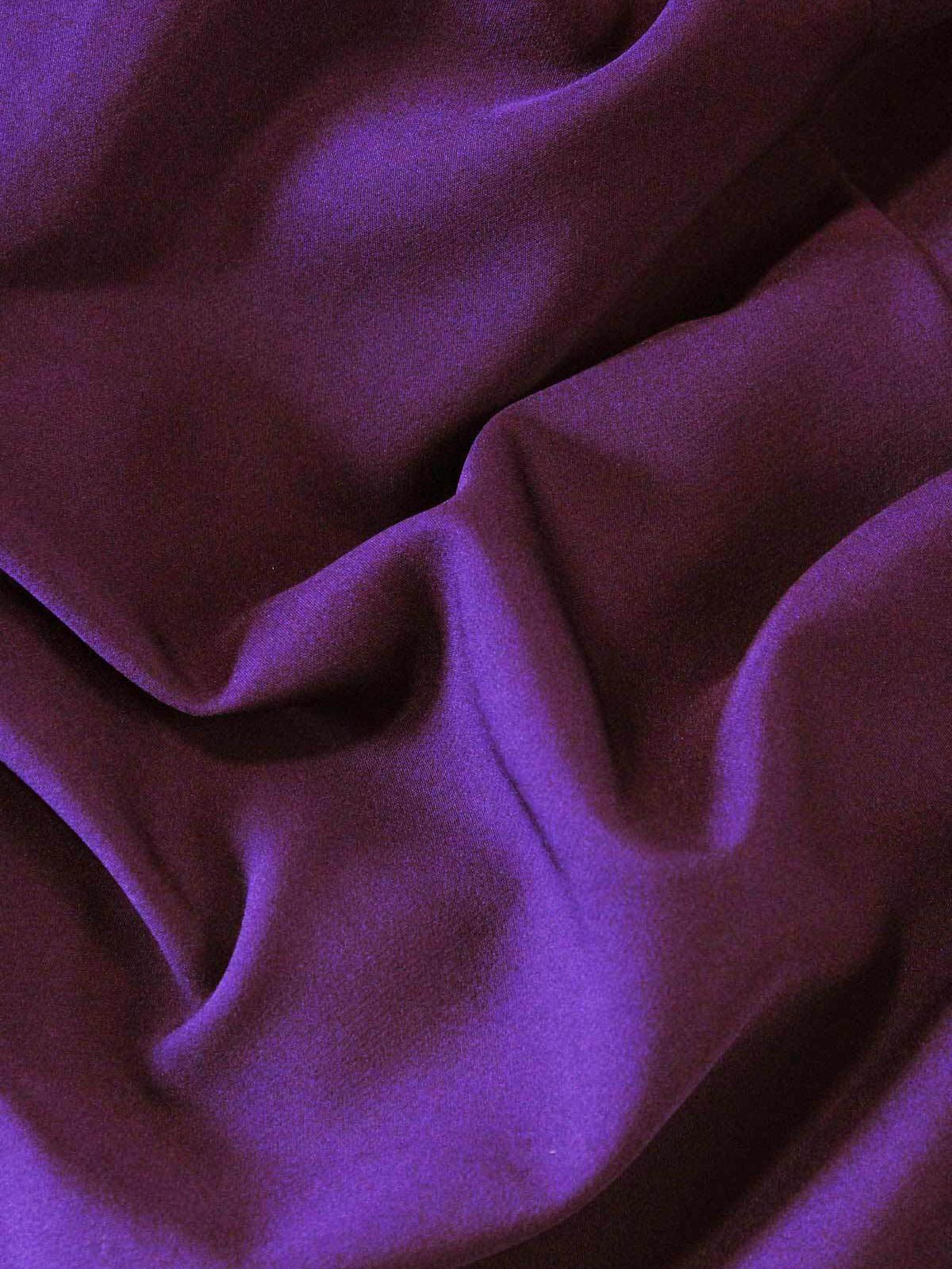 Close-up of purple fabric with folds