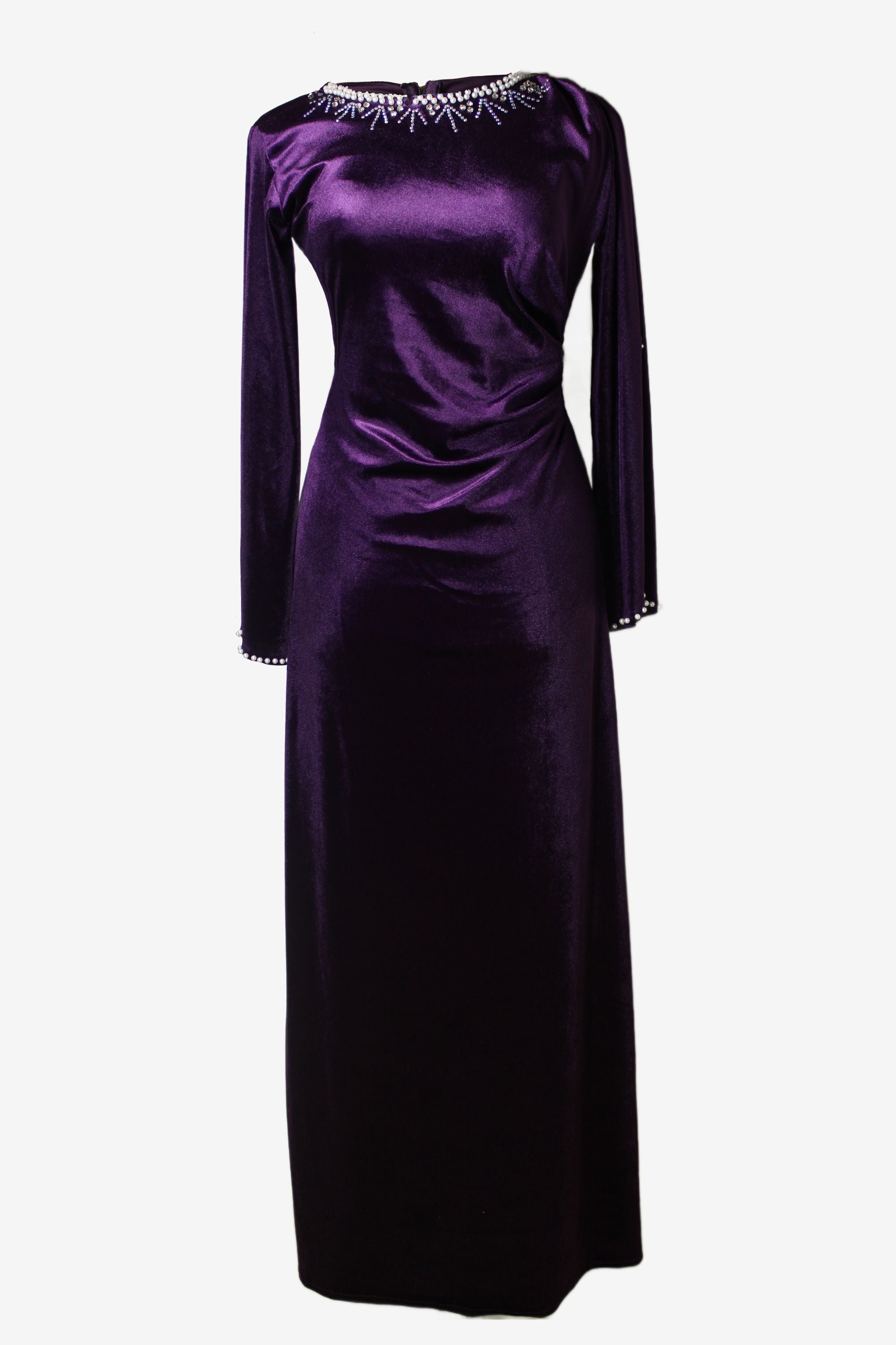 Purple velvet dress with embellished neckline on a white background