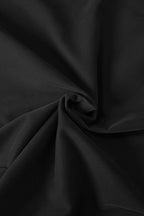Close-up of black Felt fabric with folds