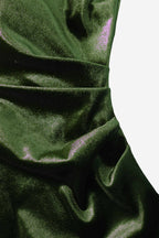 Close-up of green velvet fabric with folds