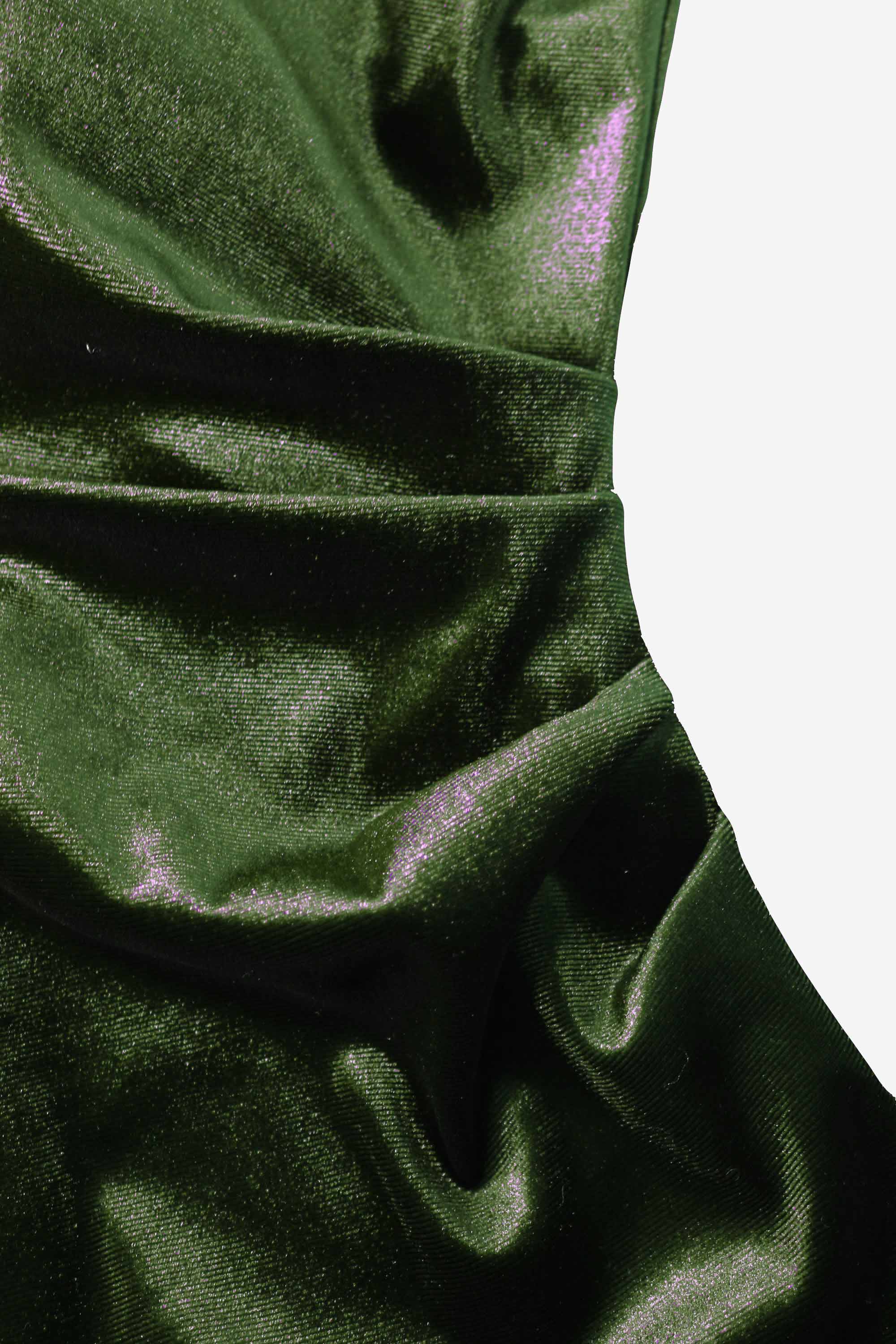 Close-up of green velvet fabric with folds