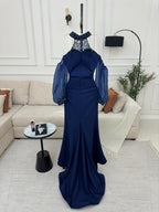 فستان باربي وأكمام الجزرة