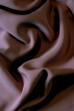 فستان مزين بتطريزات براقة