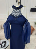 فستان باربي وأكمام الجزرة