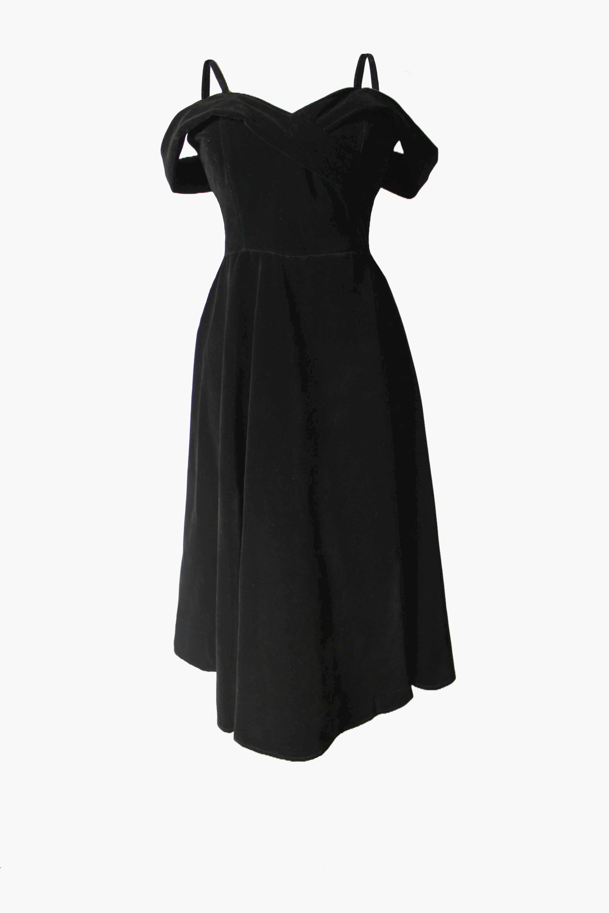 Felt Black dress with thin straps on a white background