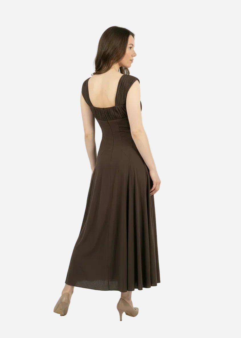 Woman wearing a brown dress on a white background