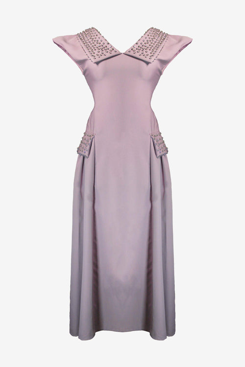 Mauve dress with embellished neckline on a white background