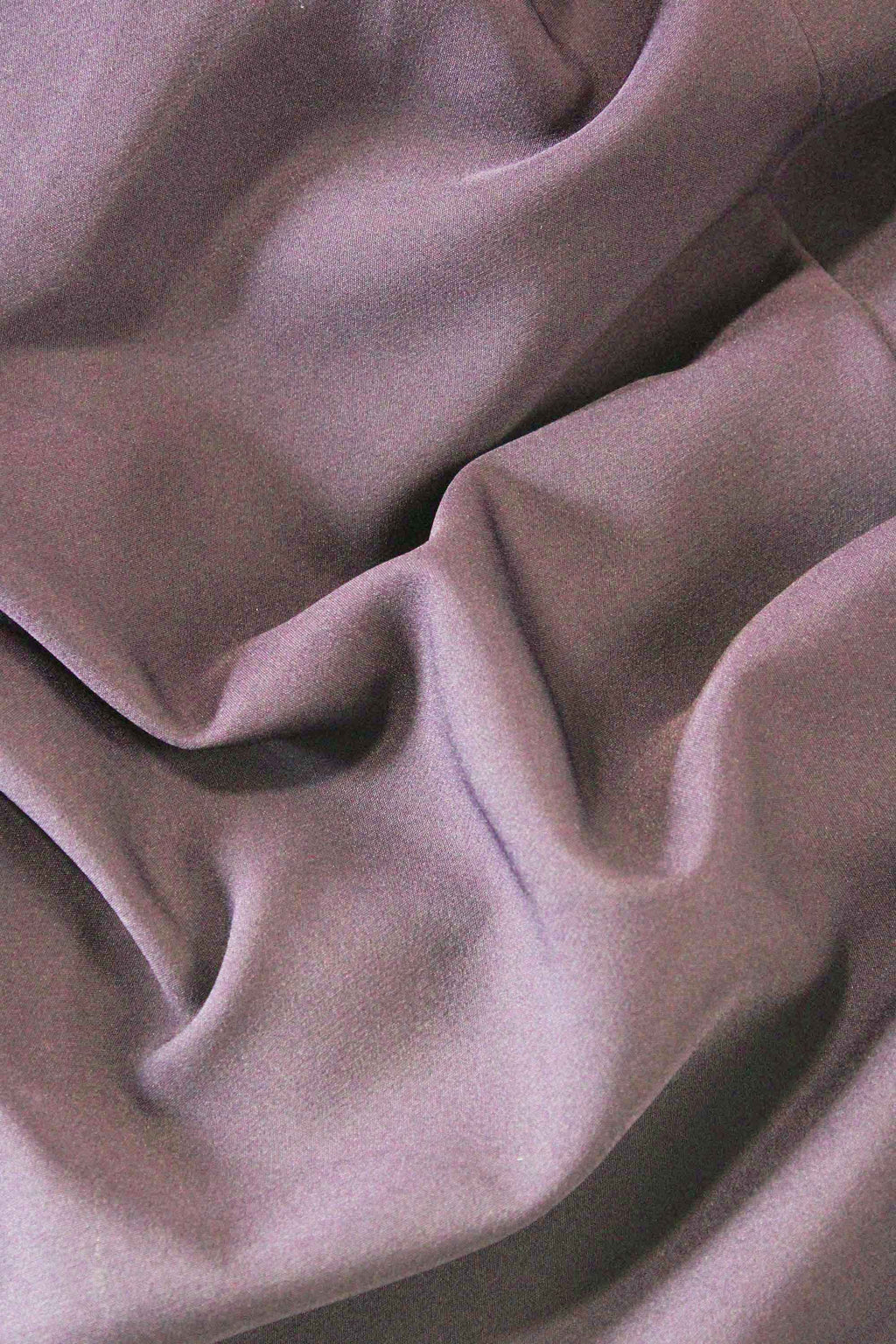 Close-up of pink fabric with folds