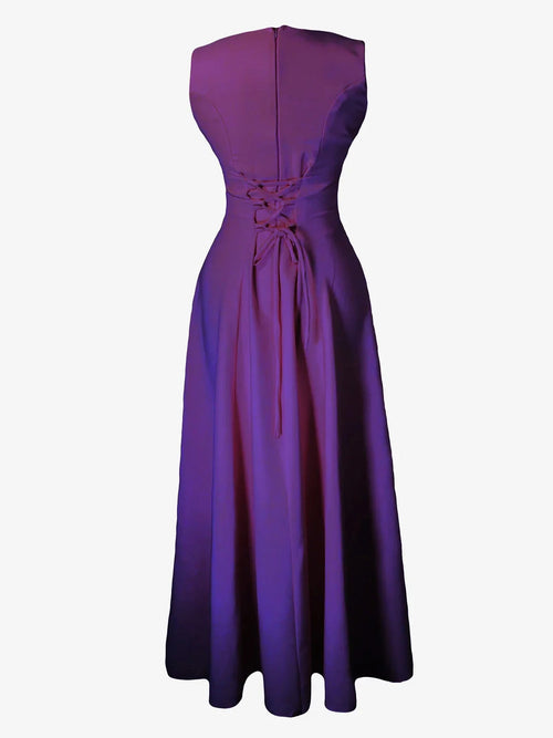 Purple strapless dress with a tie waist on a white background